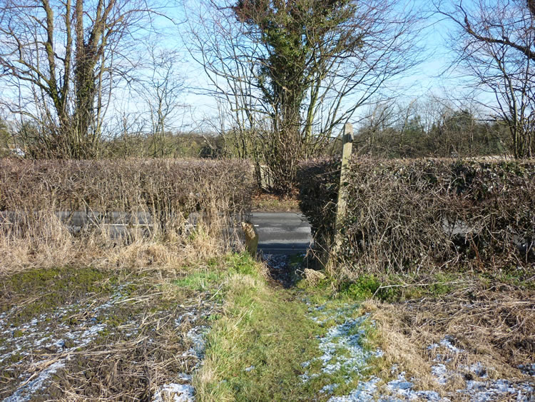 Photograph: 2010: Ivy scraped off, sign visible